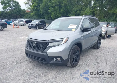 2019 Honda Passport Elite z USA, uszkodzony, nr VIN 5FNYF8H05KB010810